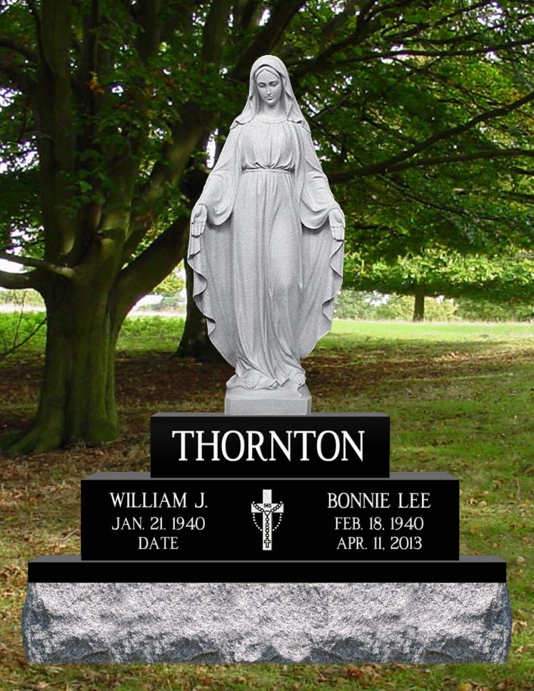Black granite monument with a full carved statue of Mary standing above it